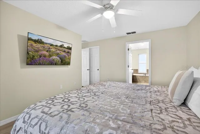 an aerial view of residential house with outdoor space and swimming pool