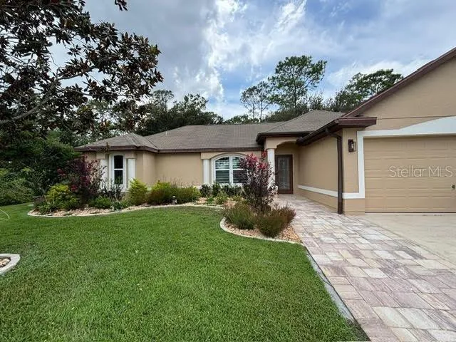 $344,900 | 42 Russell Drive, Palm Coast, FL 32164