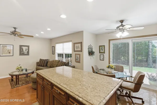 a living room with furniture and a table