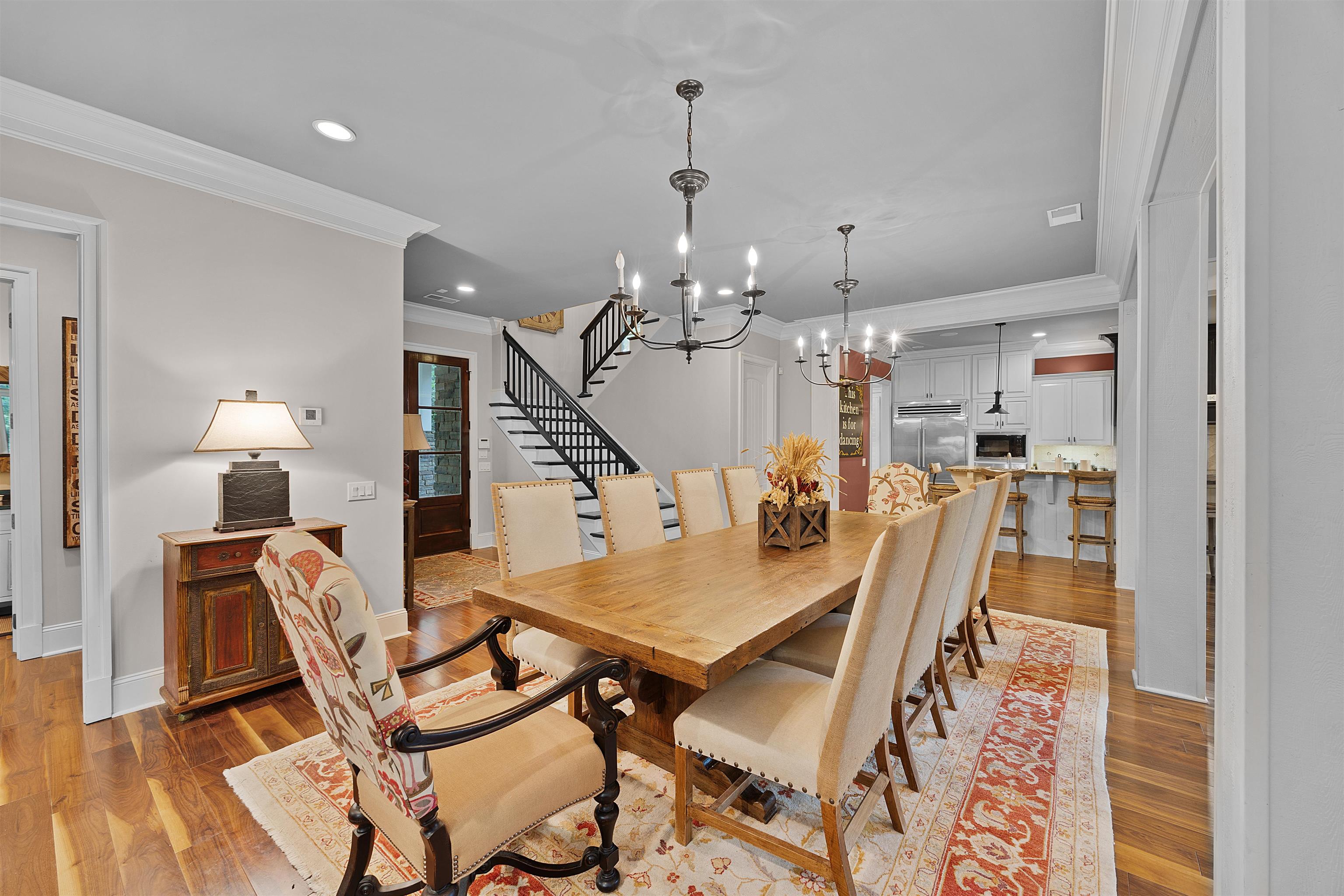25 Caney Hollow Road Counce, TN 38326 - Photo 8 of 40 Dining space with ornamental molding, a chandelier, recessed lighting, wood finished floors, and baseboards