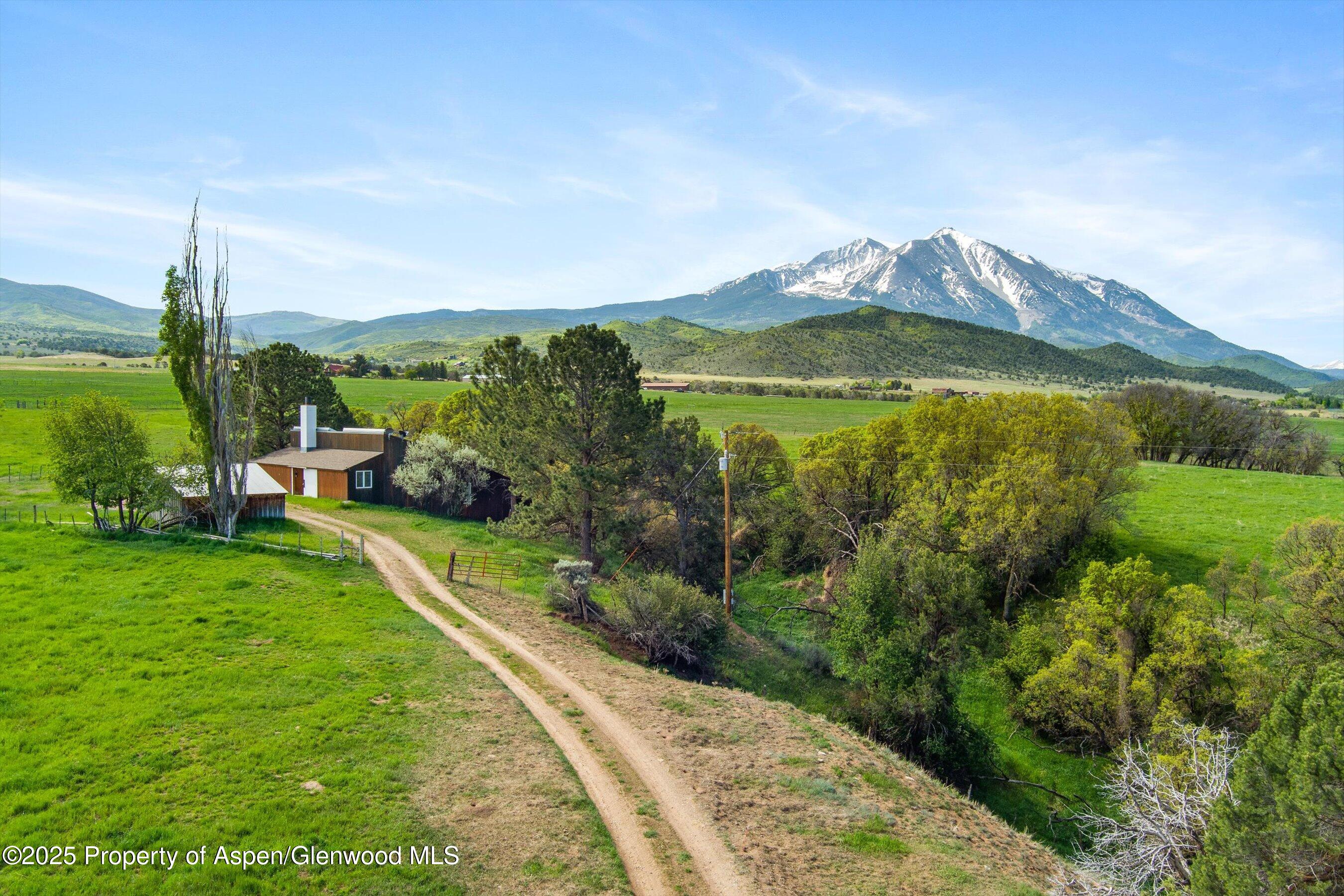 1634 Prince Creek Road Carbondale, CO 81623 - Photo 12 of 25 a view of a lake with a mountain in the back