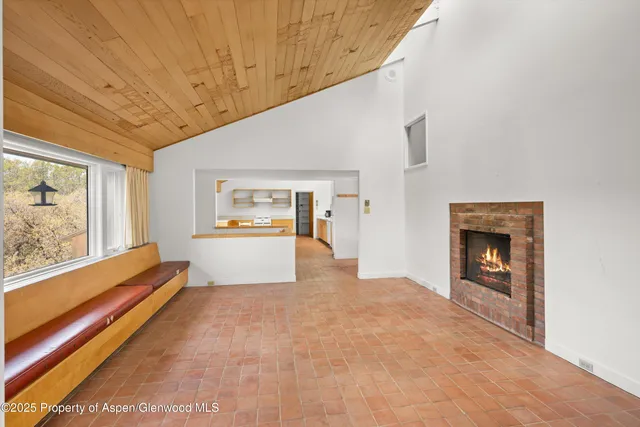 a view of an ocean and a mountain