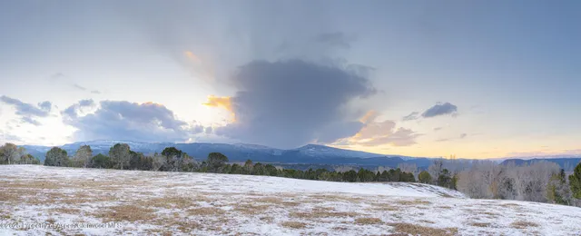 a view of a lake with a mountain in the background