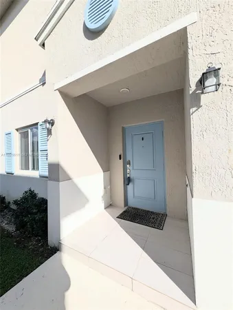 a view of a back yard of the house