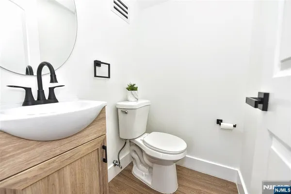 a bathroom with a toilet and a sink
