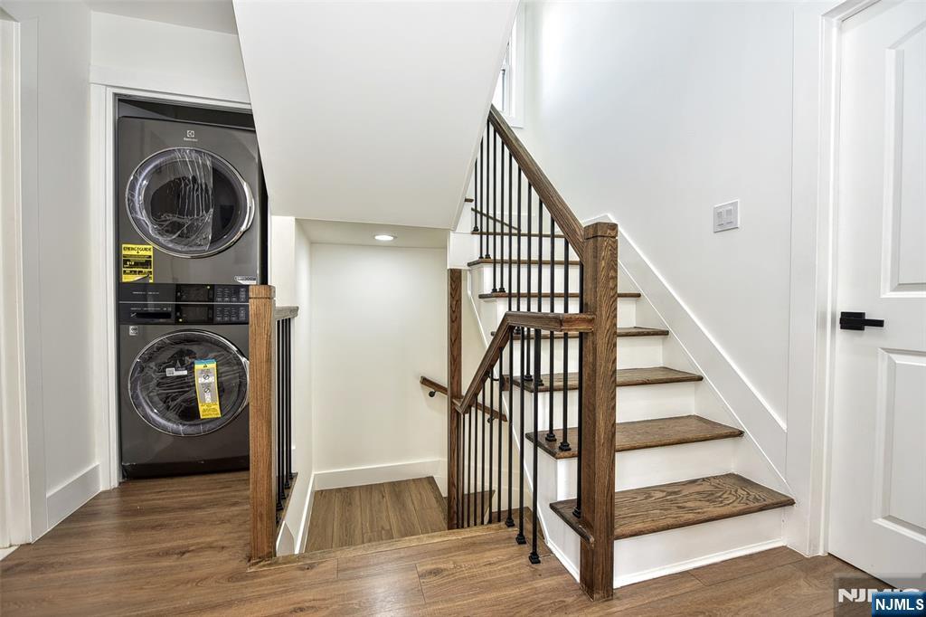 100 Chestnut Street Rochelle Park, NJ 07662 - Photo 15 of 42 a view of a hallway with washer and dryer