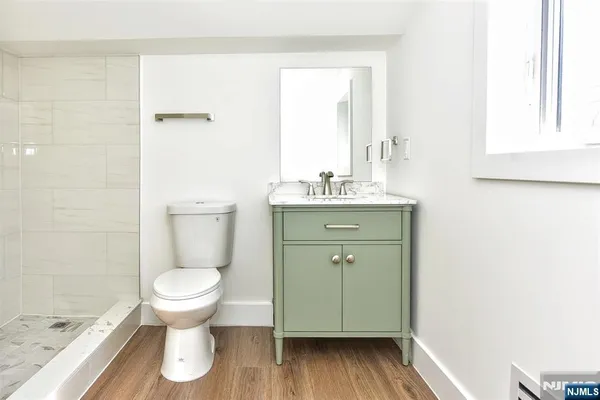 a bathroom with a sink and a toilet