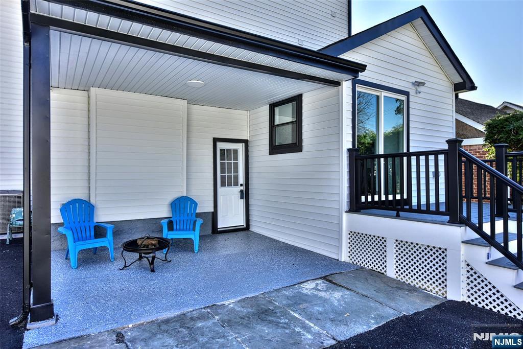 100 Chestnut Street Rochelle Park, NJ 07662 - Photo 41 of 42 a balcony with wooden floor and furniture