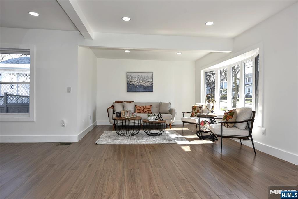 100 Chestnut Street Rochelle Park, NJ 07662 - Photo 6 of 42 a living room with furniture and wooden floor
