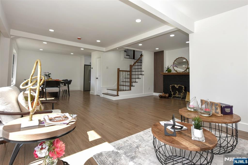 100 Chestnut Street Rochelle Park, NJ 07662 - Photo 7 of 42 a living room with furniture and wooden floor