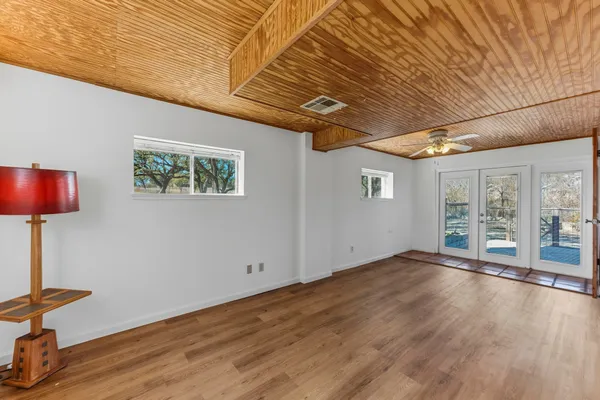 a view of a room with stairs and a window