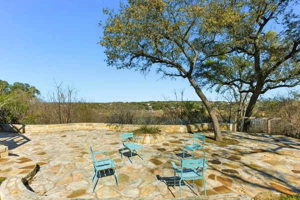 a view of swimming pool with a patio