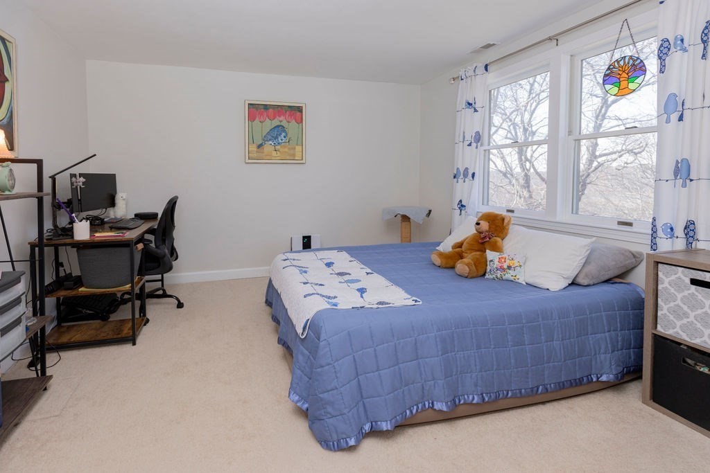 126 Lafayette Street Marblehead, MA 01945 - Photo 22 of 30 a bedroom with a bed and a window