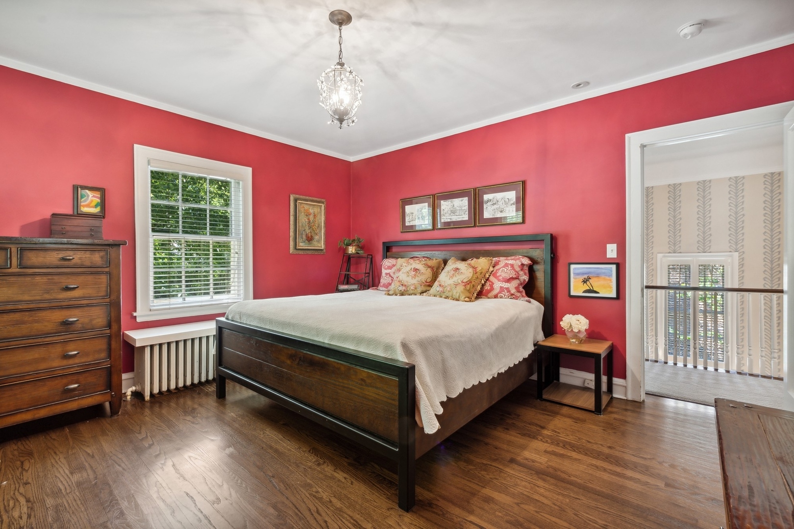235 Church Road Winnetka, IL 60093 - Photo 16 of 27 a bedroom with a bed and wooden floor
