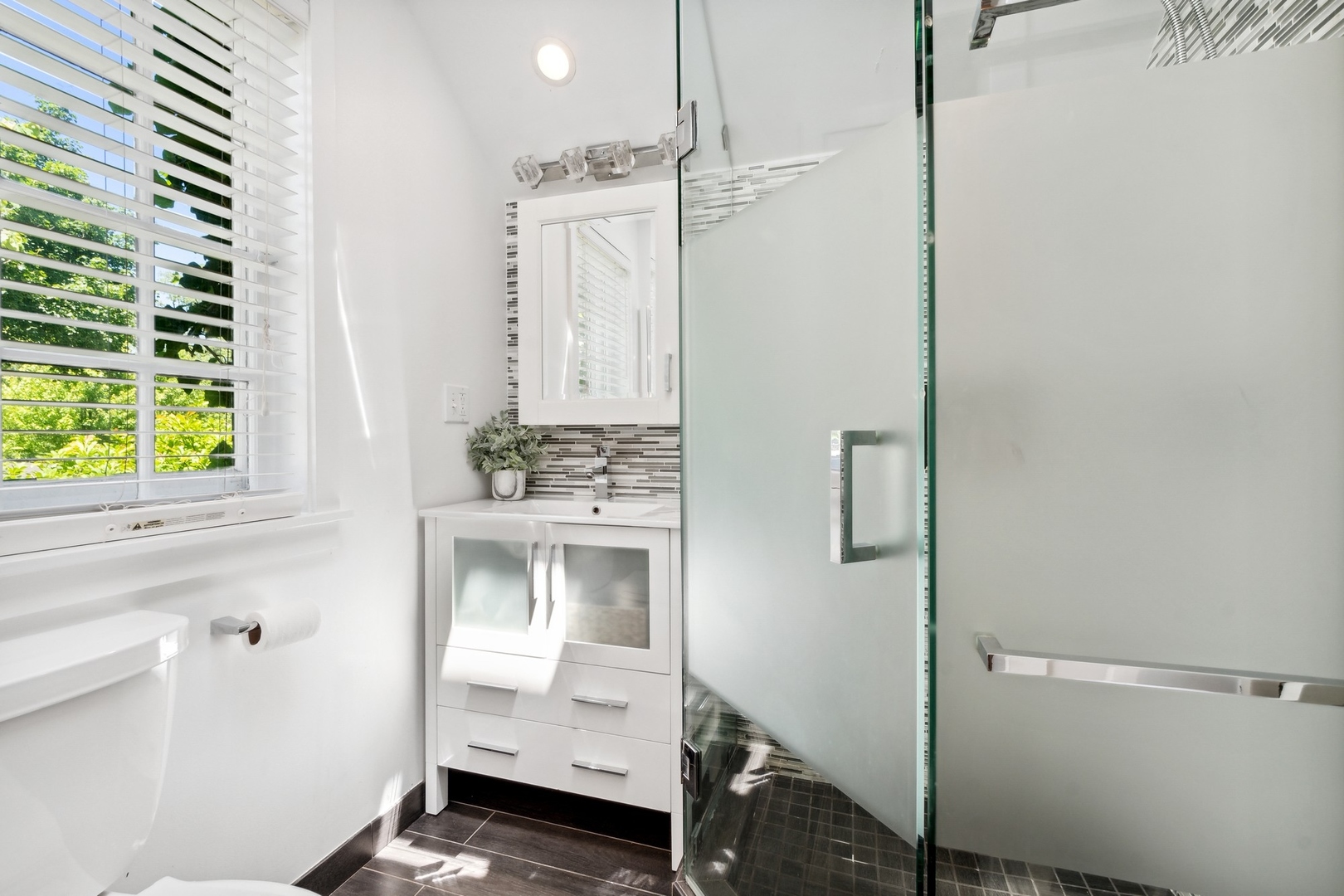 235 Church Road Winnetka, IL 60093 - Photo 19 of 27 a bathroom with a sink and a mirror