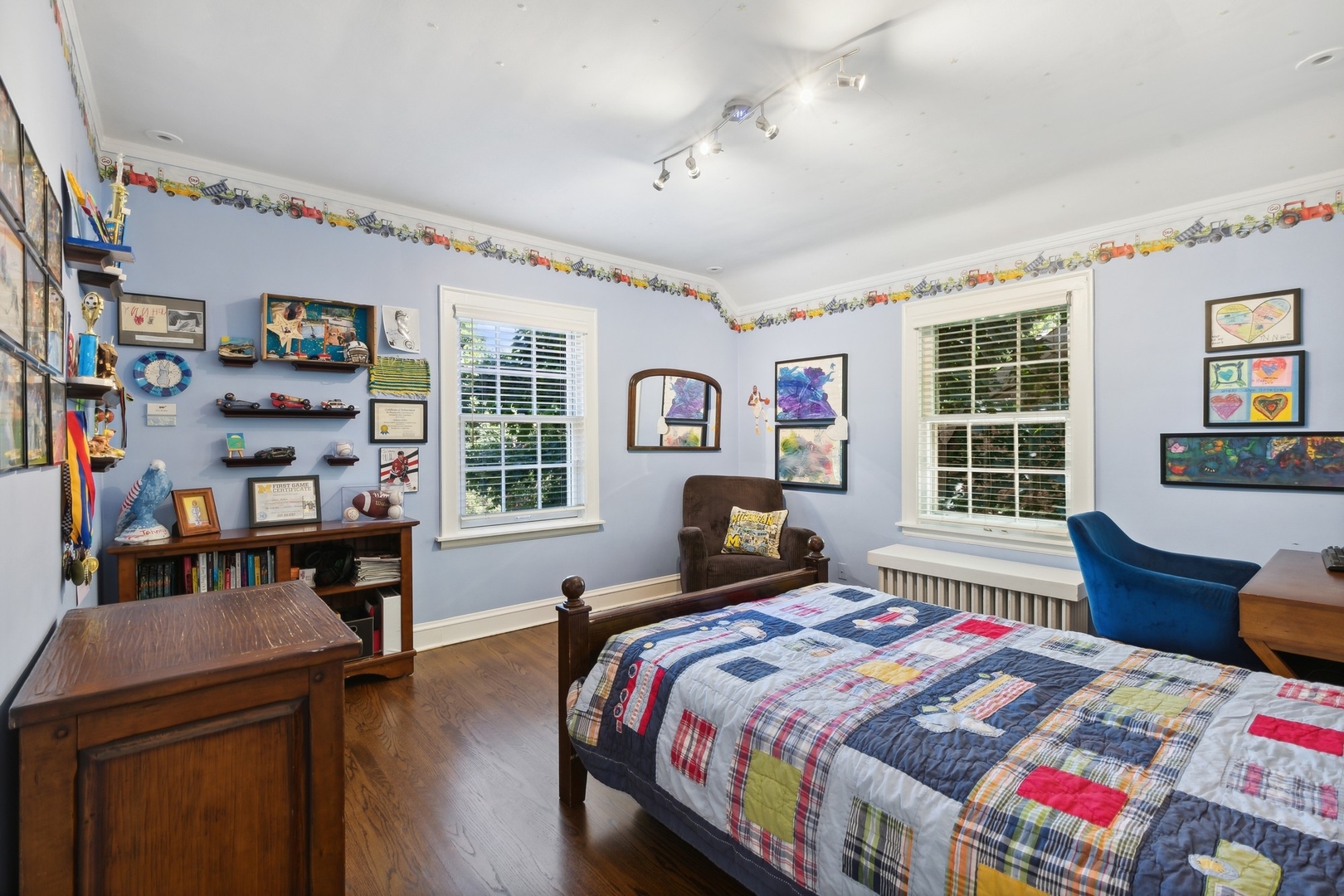 235 Church Road Winnetka, IL 60093 - Photo 20 of 27 a bedroom with a bed and wooden floor