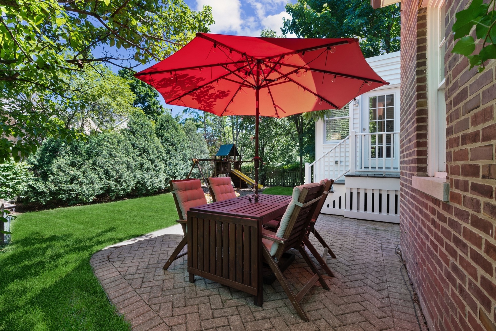 235 Church Road Winnetka, IL 60093 - Photo 23 of 27 a view of backyard with seating and green space