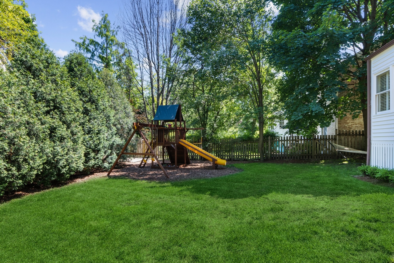 235 Church Road Winnetka, IL 60093 - Photo 24 of 27 a view of a park with a slide