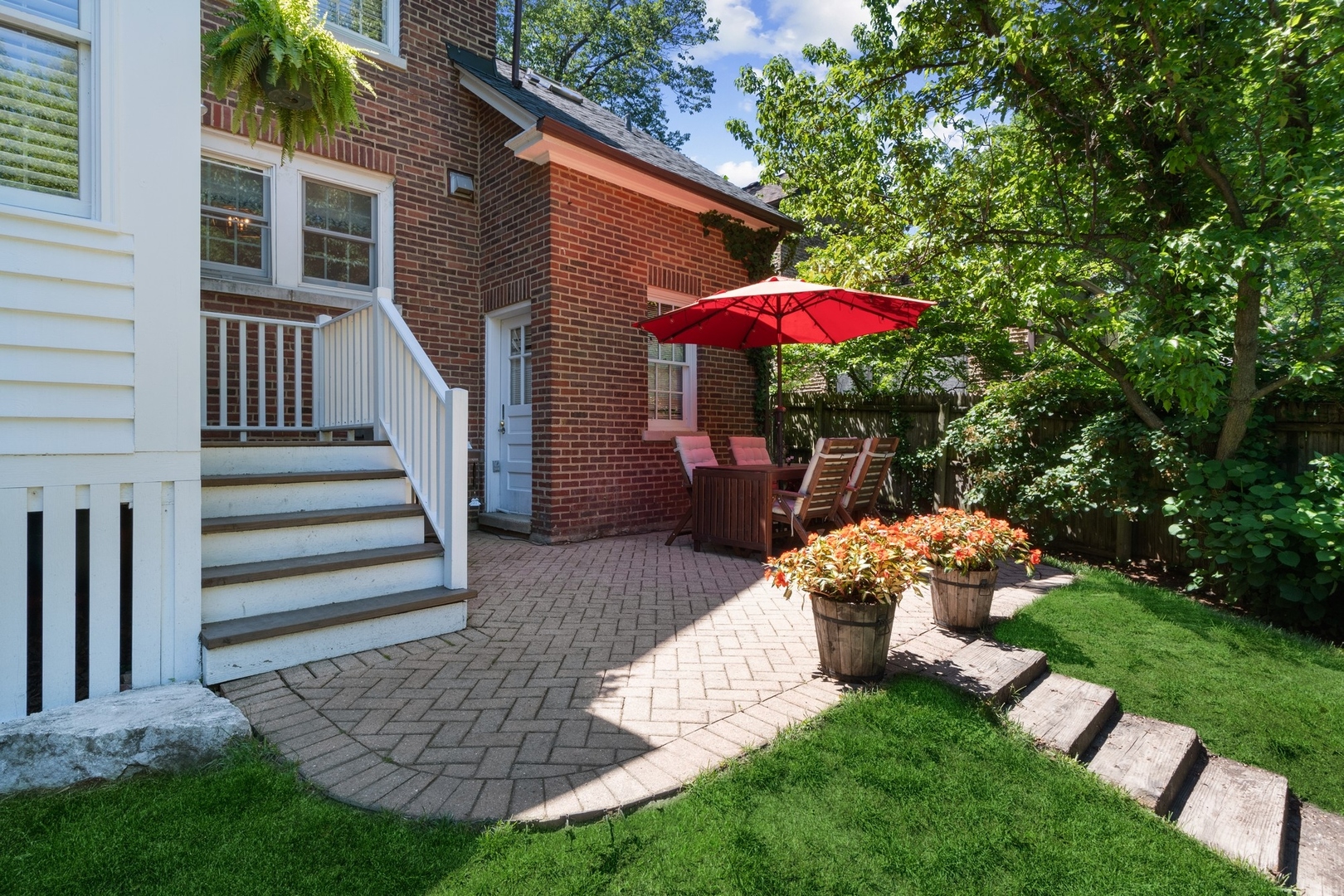 235 Church Road Winnetka, IL 60093 - Photo 25 of 27 a front view of a house with a yard