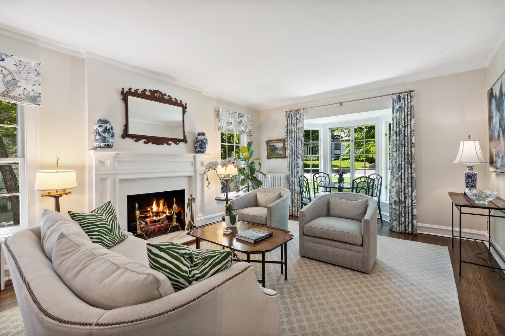 235 Church Road Winnetka, IL 60093 - Photo 4 of 27 a living room with furniture and a fireplace