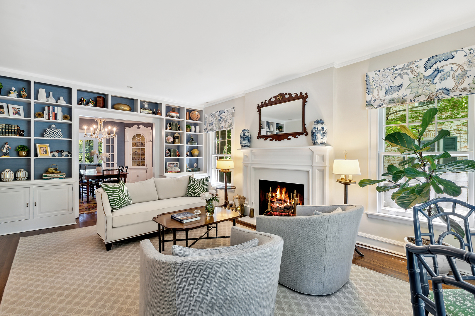 235 Church Road Winnetka, IL 60093 - Photo 7 of 27 a living room with furniture and a fireplace