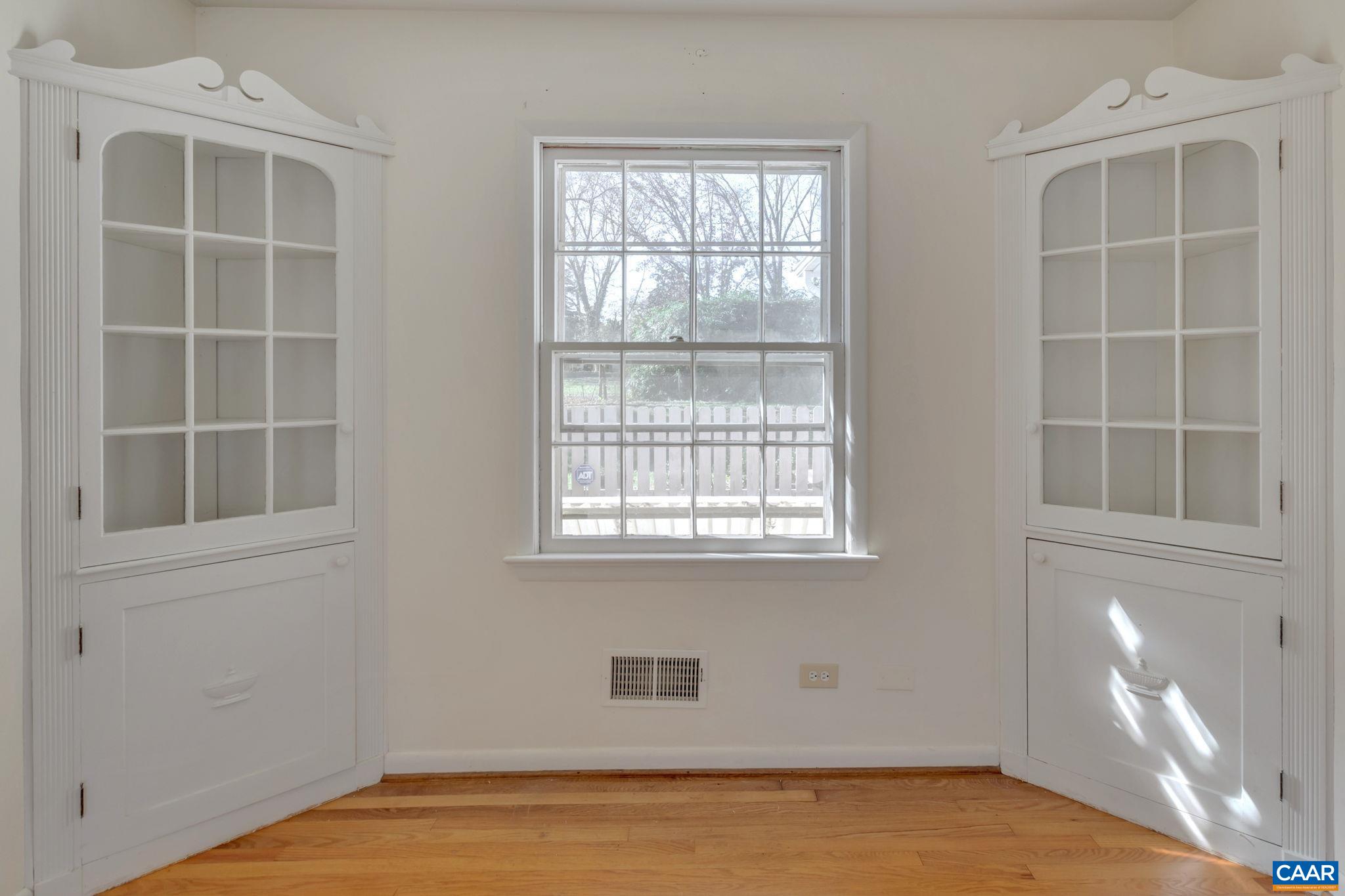1406 Holly Road Charlottesville, VA 22901 - Photo 14 of 62 a view of an empty room with a window