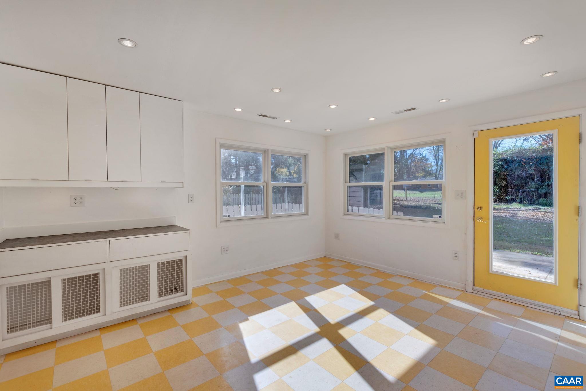 1406 Holly Road Charlottesville, VA 22901 - Photo 29 of 62 a view of an empty room with a window