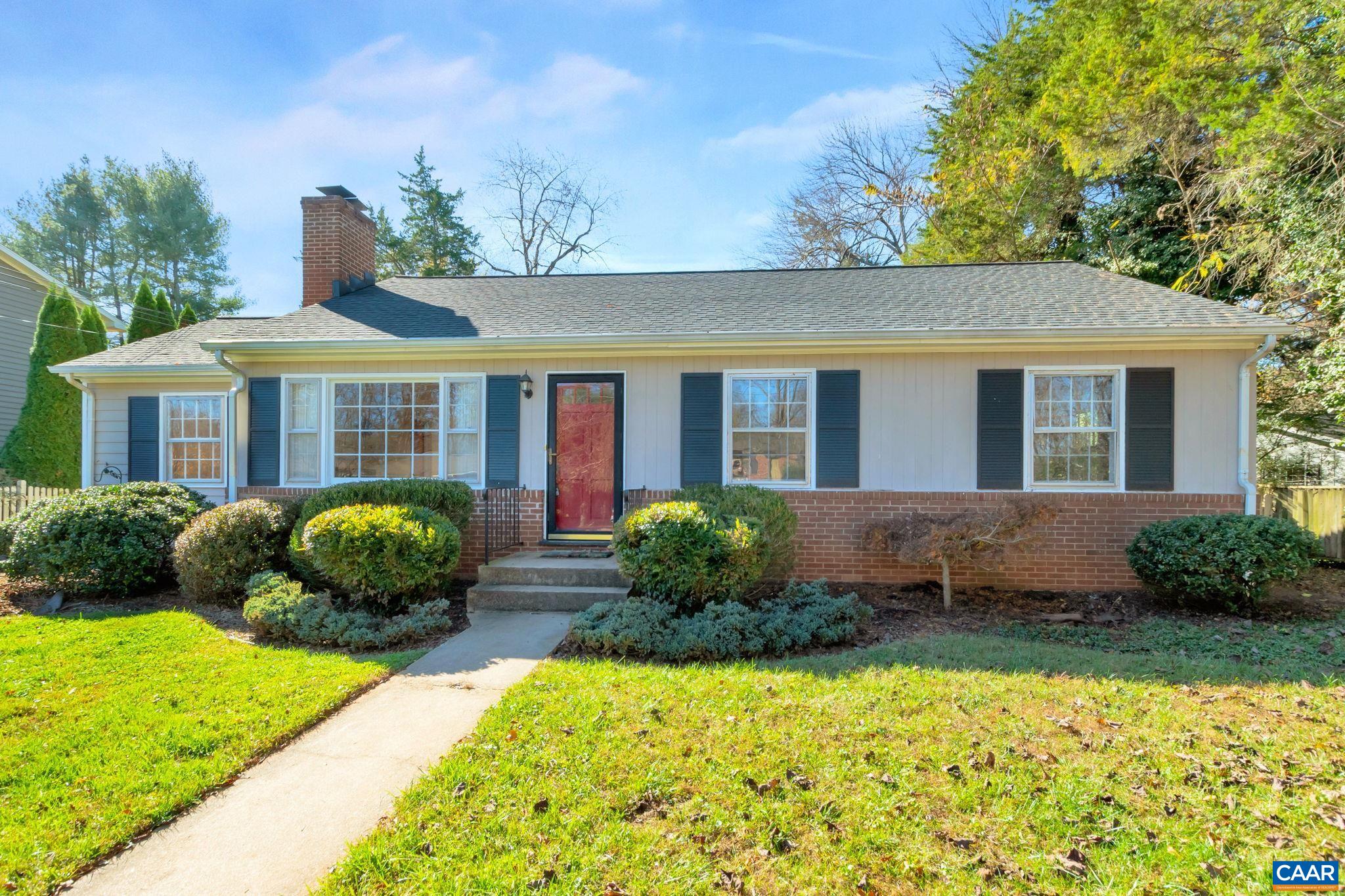 1406 Holly Road Charlottesville, VA 22901 - Photo 3 of 62 a front view of a house with garden