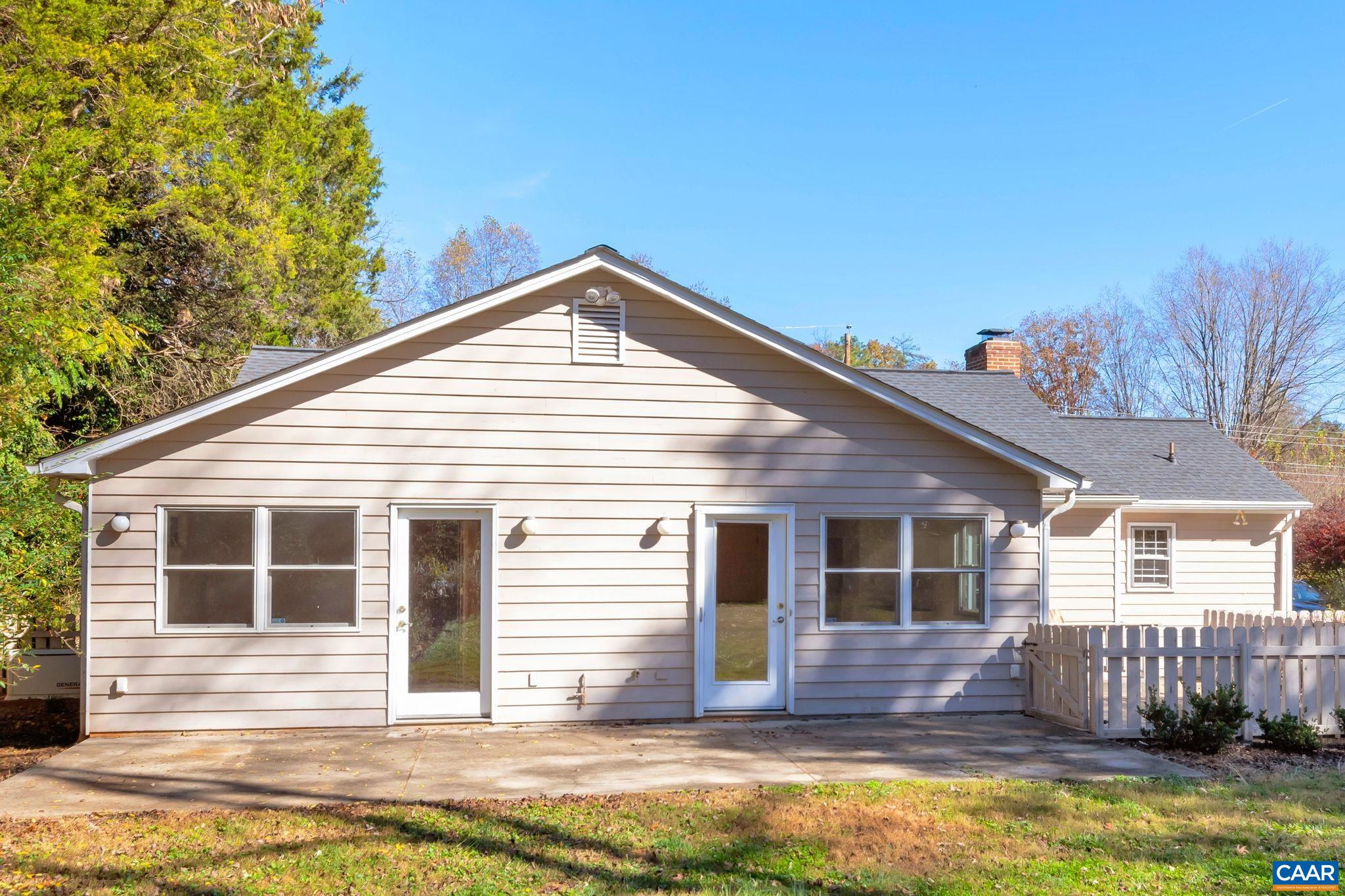 1406 Holly Road Charlottesville, VA 22901 - Photo 53 of 62 a front view of a house with a yard