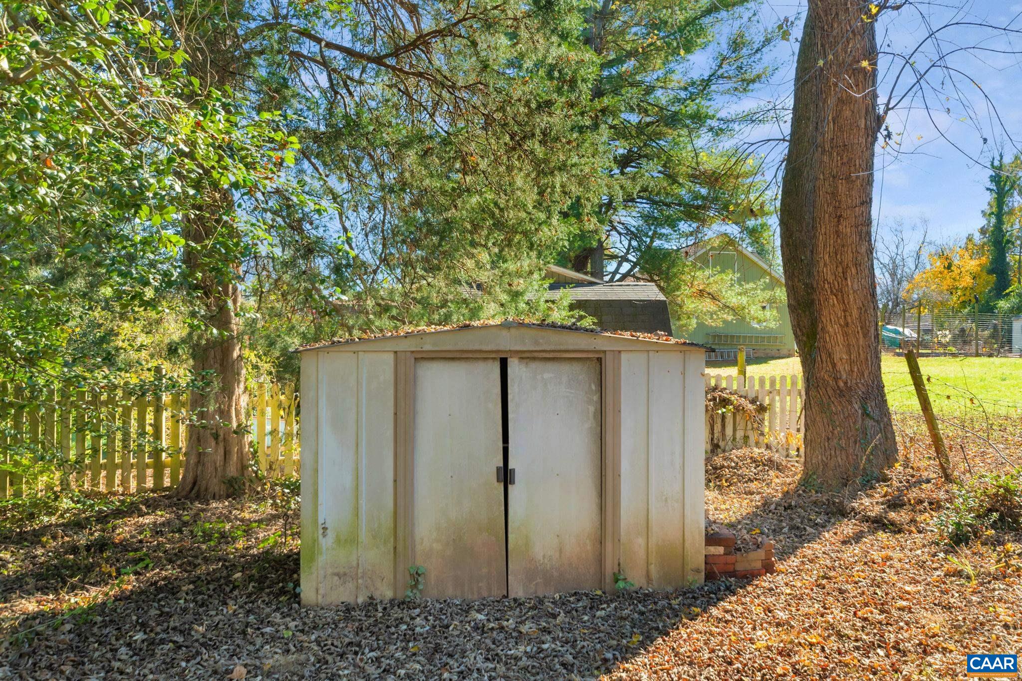 1406 Holly Road Charlottesville, VA 22901 - Photo 59 of 62 a view of a house with a yard