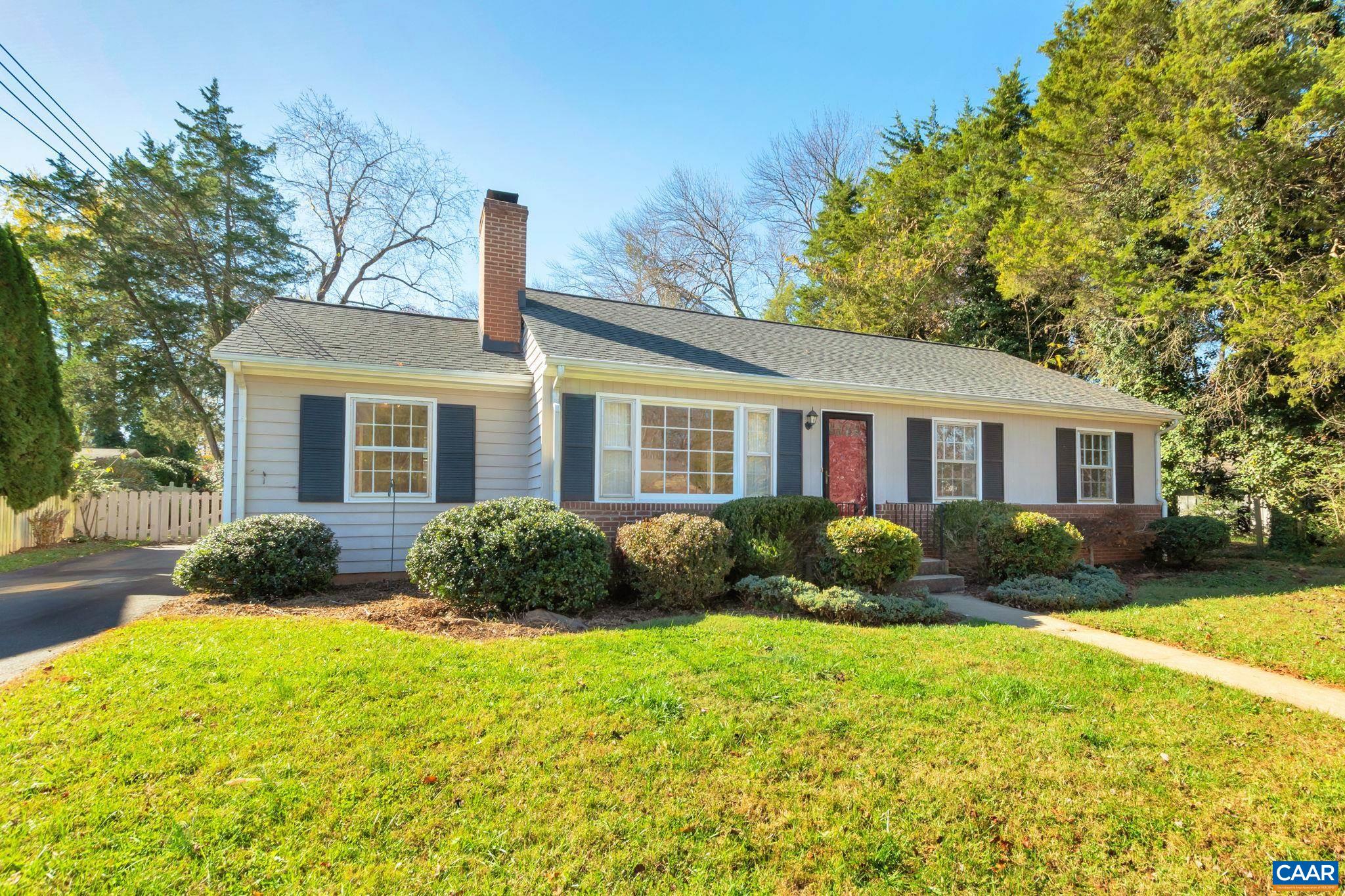 1406 Holly Road Charlottesville, VA 22901 - Photo 62 of 62 a front view of a house with garden