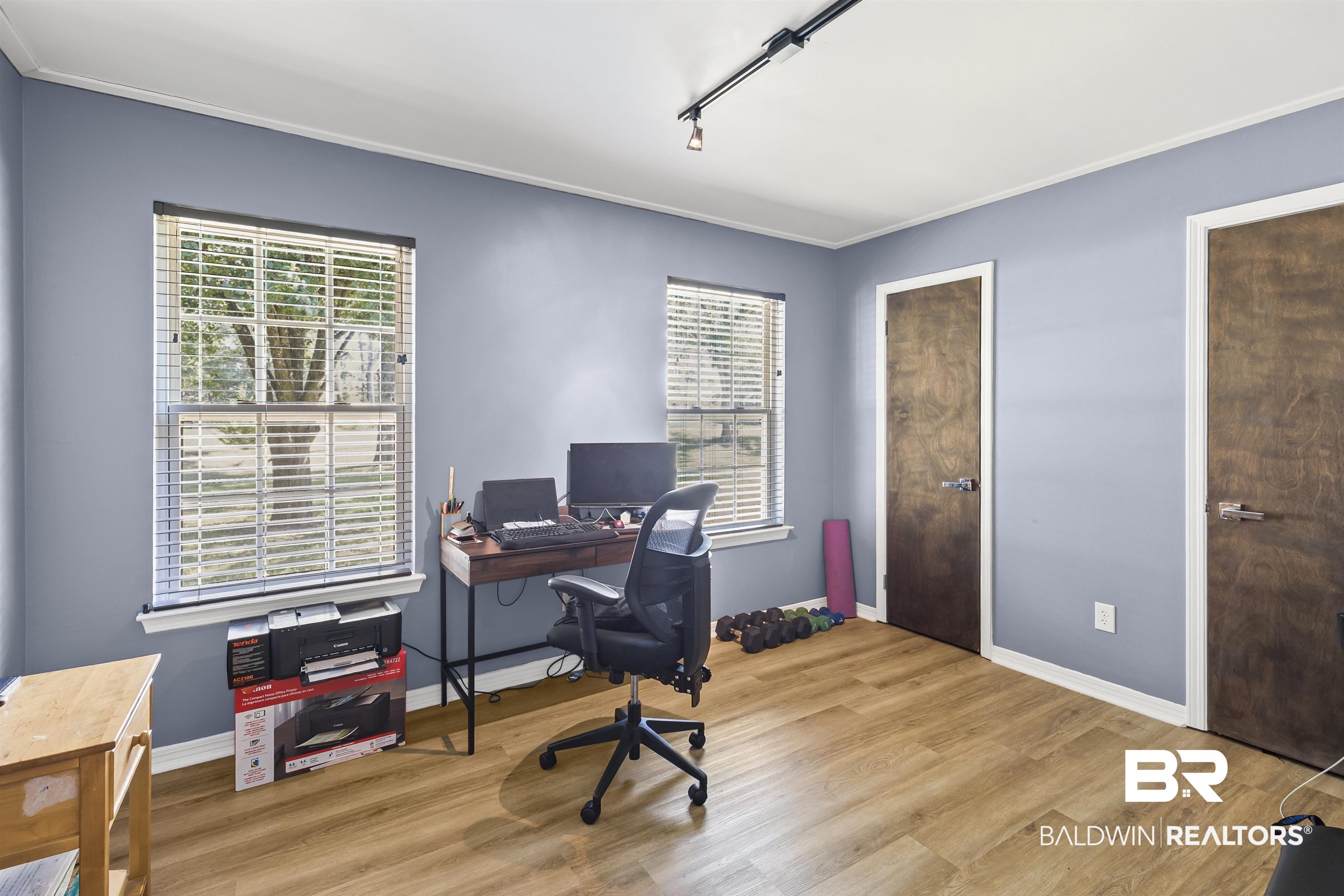 8911 Owassa Road Evergreen, AL 36401 - Photo 17 of 24 Office space with light wood-style floors, rail lighting, and crown molding