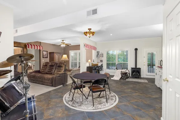 a view of livingroom with furniture and natural light