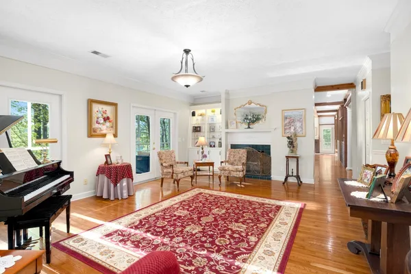 a living room with furniture and windows