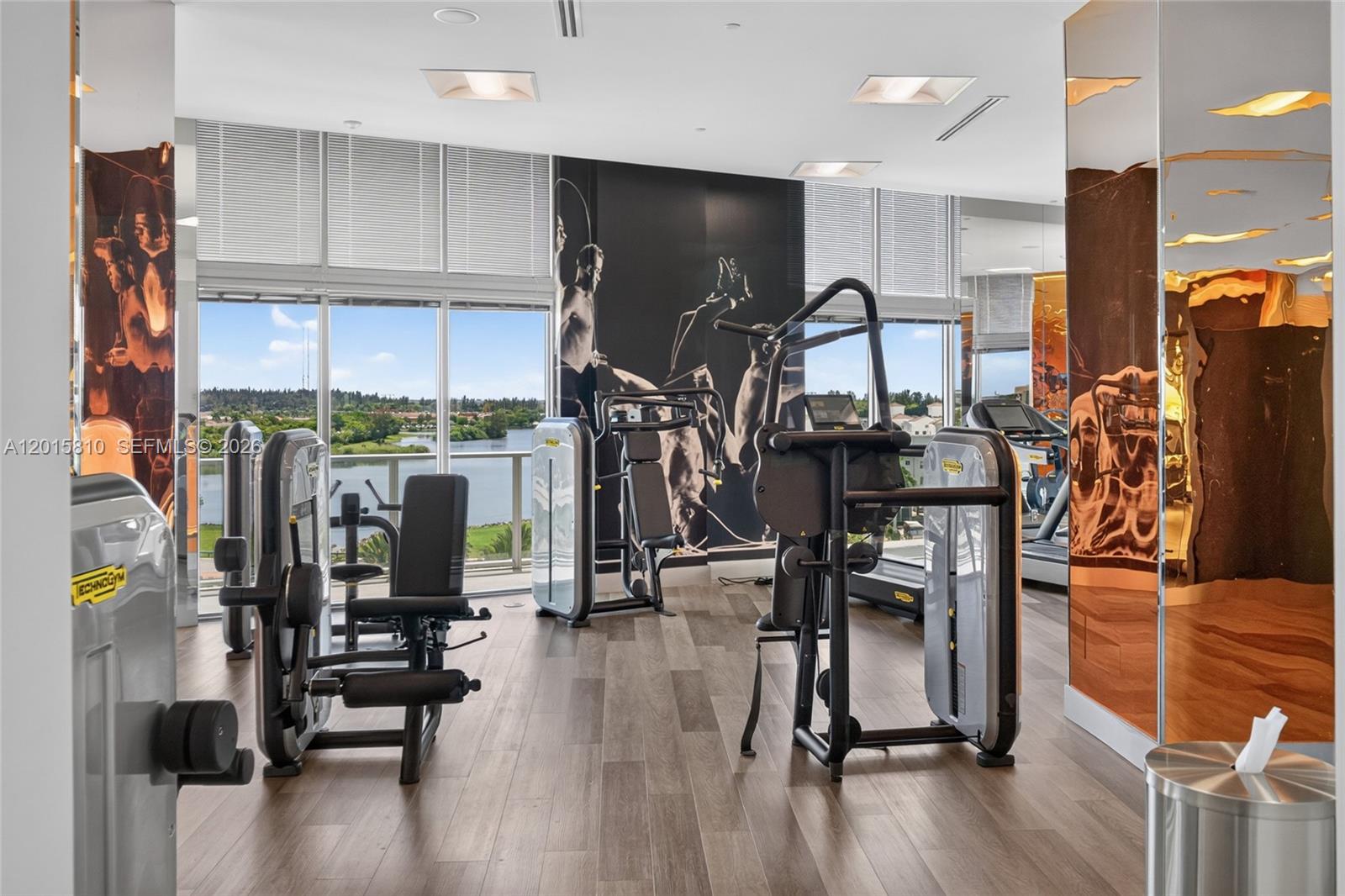 2000 Metropica Way, Unit 1902 Sunrise, FL 33323 - Photo 34 of 40 a view of a room with gym equipment
