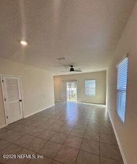 830 Observatory Parkway Jacksonville, FL 32218 - Photo 4 of 28 a view of an empty room with window and wooden floor
