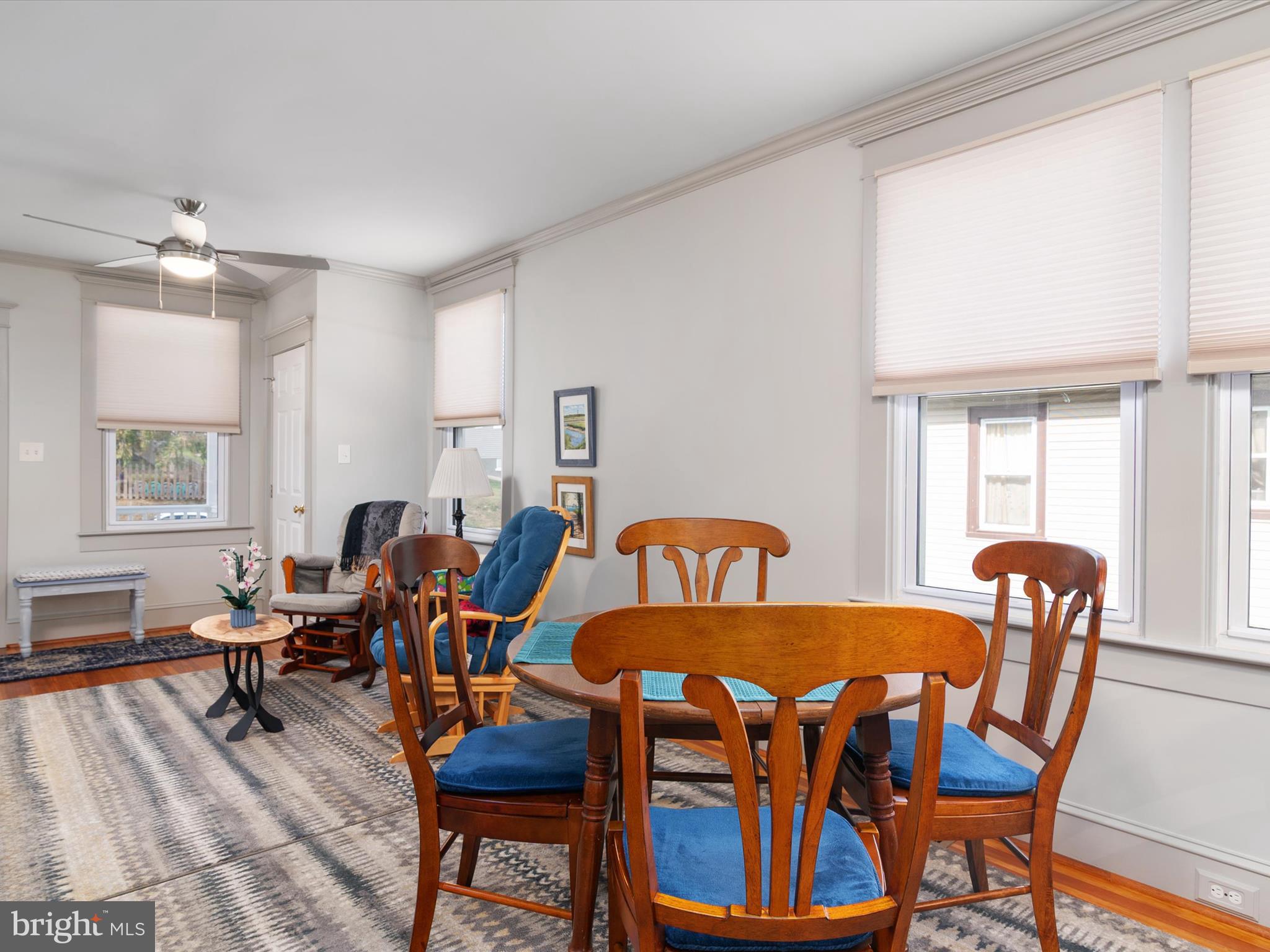 3669 Hineline Road Baltimore, MD 21229 - Photo 11 of 33 a view of a dining room with furniture window and wooden floor