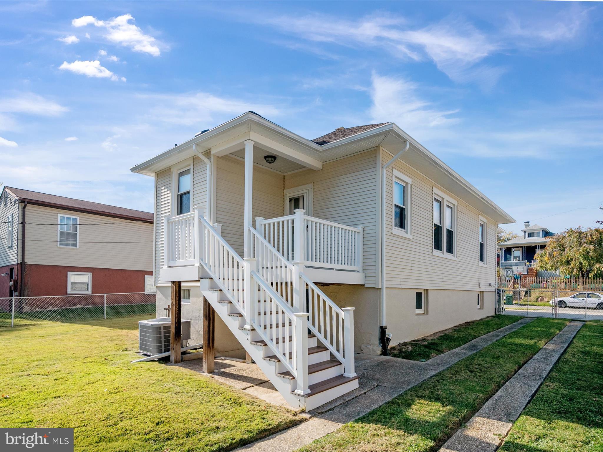 3669 Hineline Road Baltimore, MD 21229 - Photo 30 of 33 a view of house with a yard