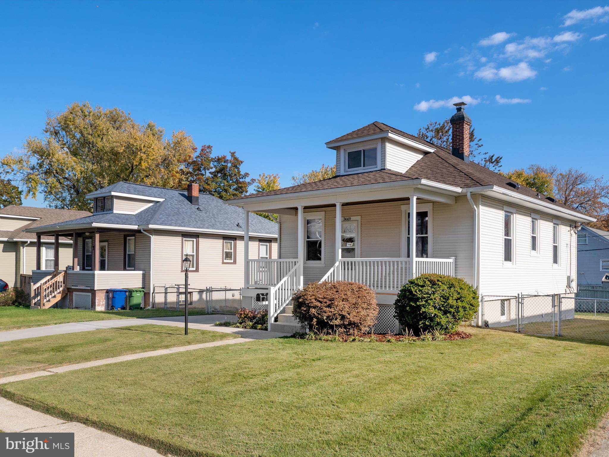 3669 Hineline Road Baltimore, MD 21229 - Photo 33 of 33 a view of a house with a backyard