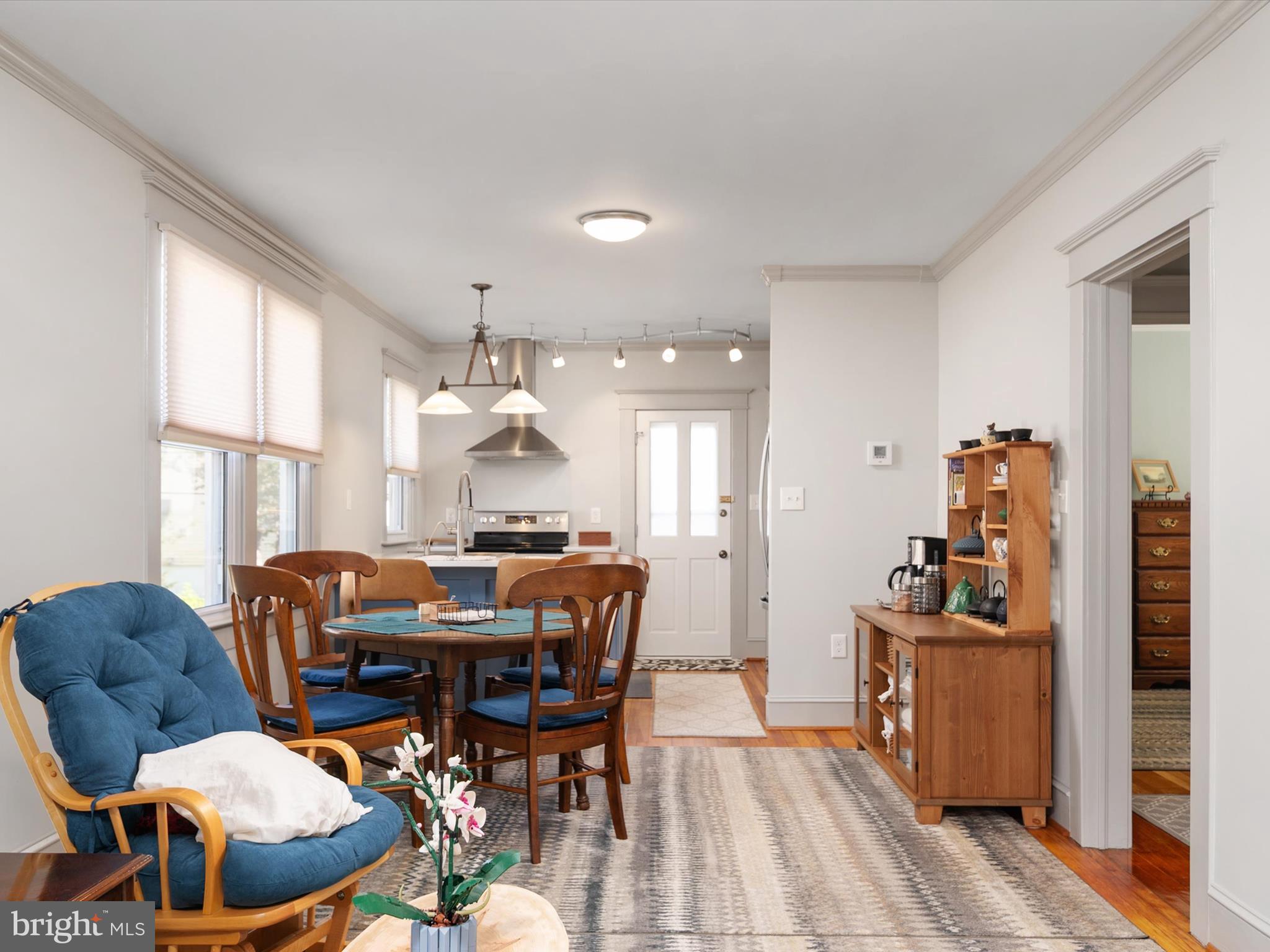 3669 Hineline Road Baltimore, MD 21229 - Photo 7 of 33 a view of a dining room with furniture and chandelier