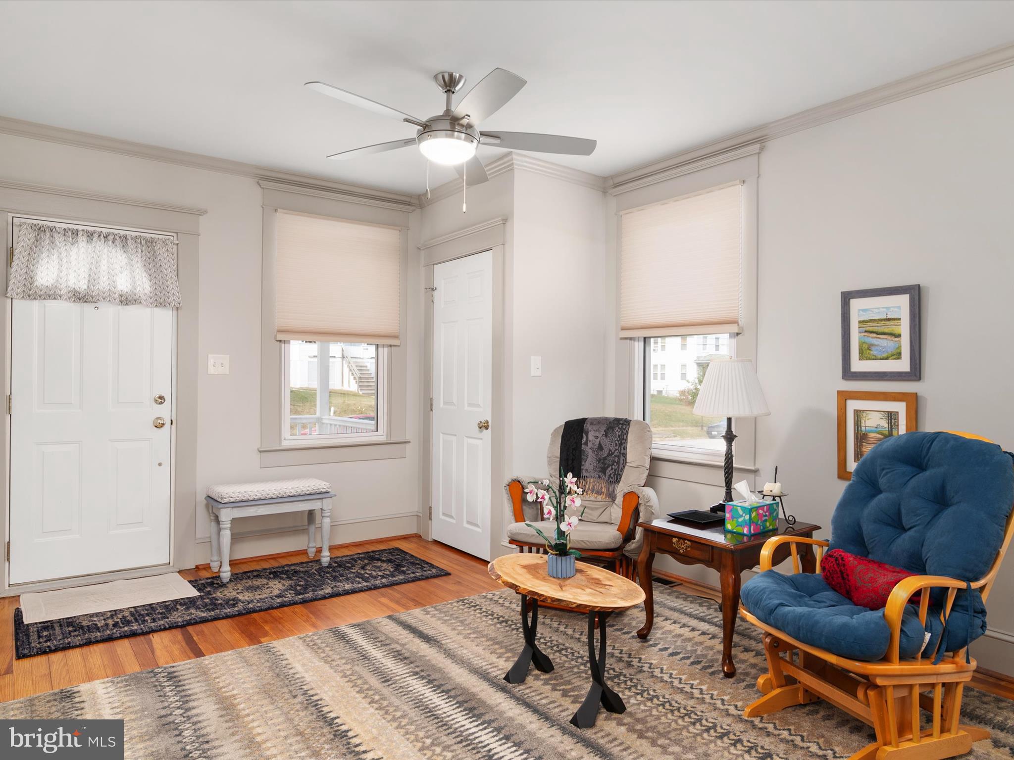 3669 Hineline Road Baltimore, MD 21229 - Photo 8 of 33 a living room with furniture a rug and a window