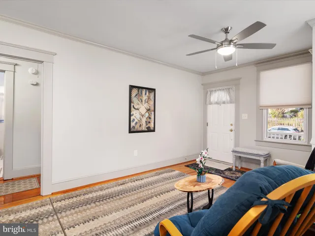 a living room with furniture and window