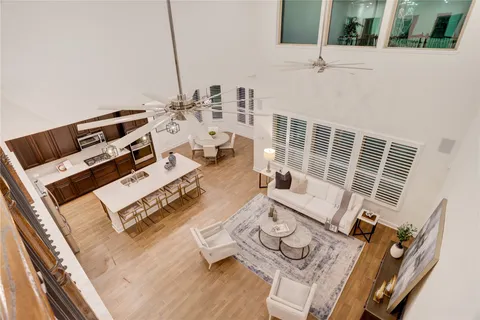 a view of balcony with wooden floor