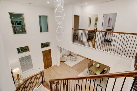 a bedroom with furniture and baby crib