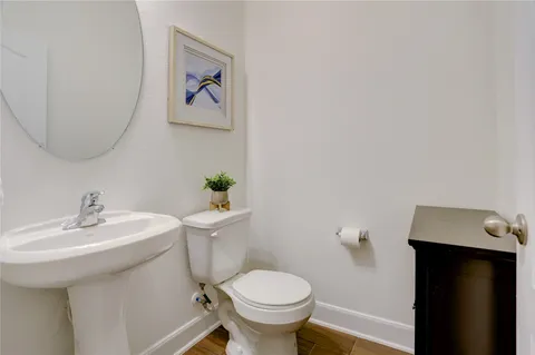 a bathroom with a toilet and a sink