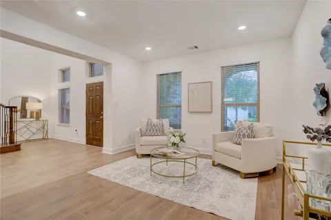 a living room with furniture and a couch