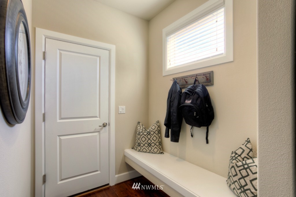 3304 170th Place Southeast, Unit 26 Bothell, WA 98012 - Photo 4 of 20 a bathroom with a sink and a mirror