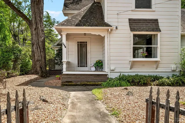 a front view of a house with a porch