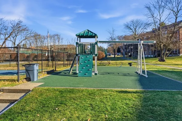 a view of a park with swings