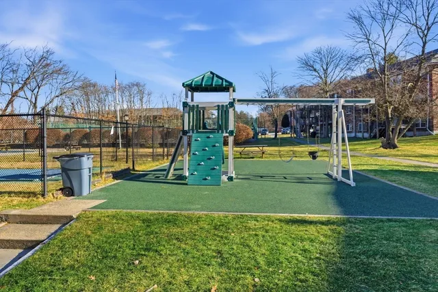 a view of a park with swings